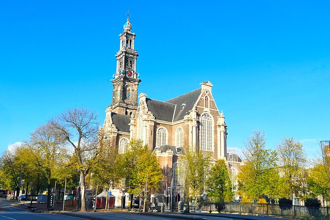 Walking Tour about Golden Age Architecture, private local guide - Prinsengracht warehouses: gables, windows, and hoisting beams