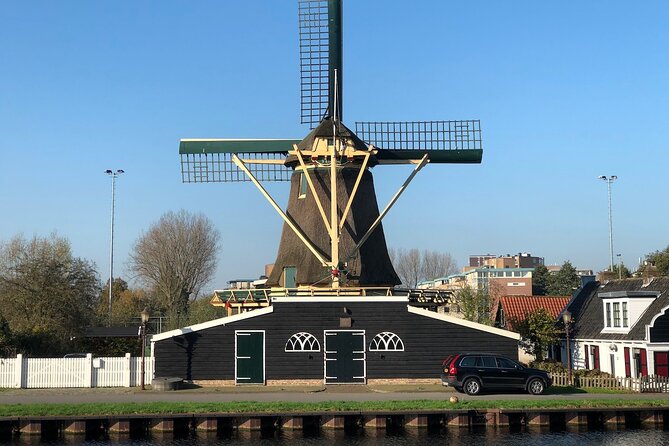 Windmill, Dairy Farms & Countryside Electric Bike Tour - Ransdorp and the Church View, The One Stop With a Twist