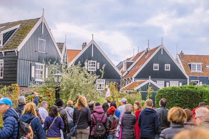 Windmill Tour from Amsterdam, Including Volendam & Marken - Marken by boat: clogs at work and a calmer coastal feel