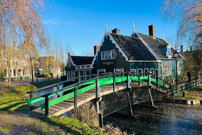 Zaanse Schans and Giethoorn Unique Day Trip with Boat Cruise - Zaanse Schans windmills, cheese, and clogs without the big-bus chaos