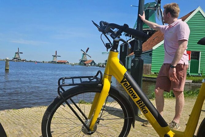 Zaanse Schans Windmills E Bike Day Trip from Amsterdam - E-bike setup, rain poncho, and how not to fight the bike